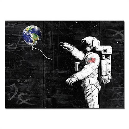 Astronaut with an earth balloon canvas