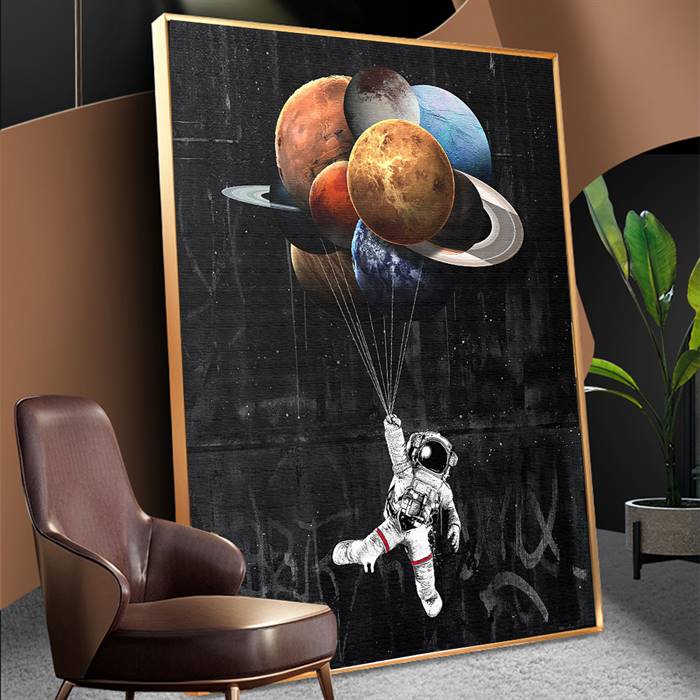 Astronaut with planet balloons canvas