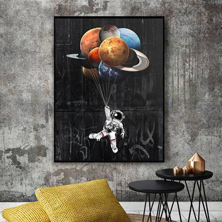 Astronaut with planet balloons canvas